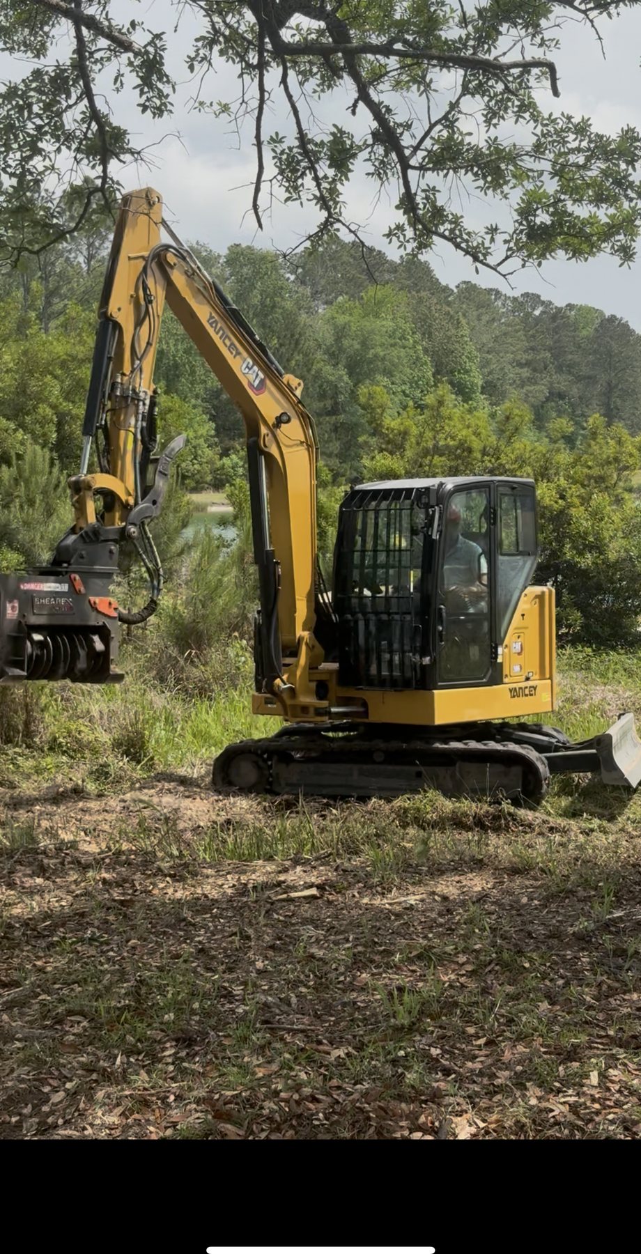 Forestry mulcher working across an open field